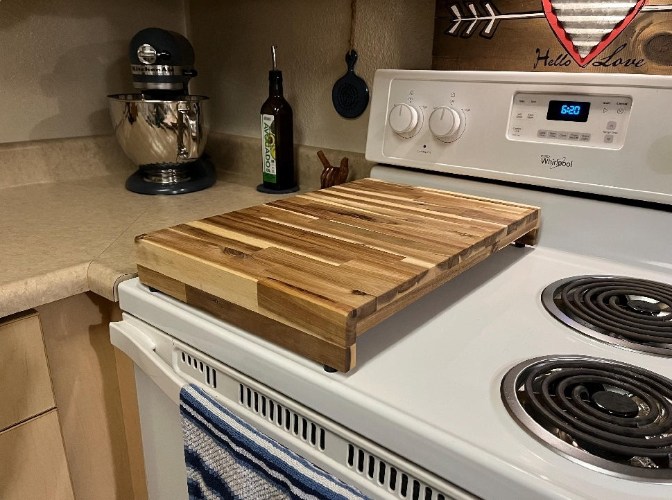 Handmade Acacia hardwood stovetop prep board fitted over a kitchen range