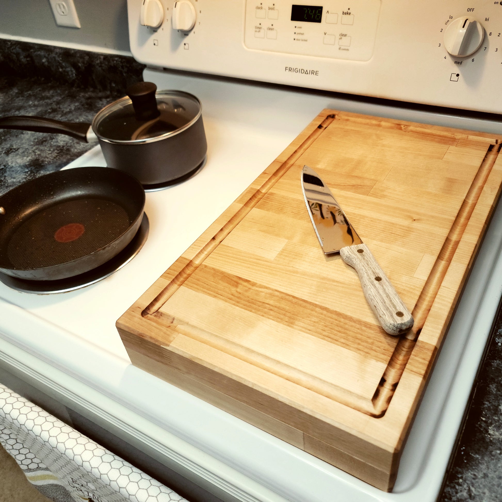 Handmade Butcher Block hardwood stovetop prep board fitted over a kitchen range
